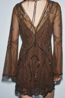 Exquisite Sequin Wavy Hemline Mini Dress