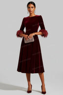 Velvet Midi Dress with Feather Cuffs - Luxe Evening Wear